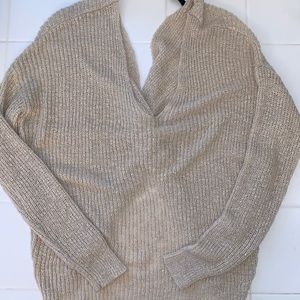 Tan V-neck sweater